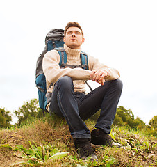 Image showing man with backpack hiking