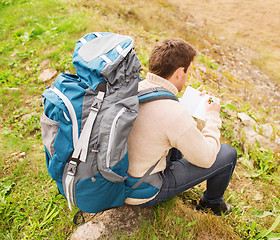 Image showing man with backpack hiking