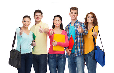 Image showing group of smiling teenagers showing thumbs up