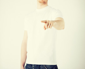 Image showing man pointing his finger at you