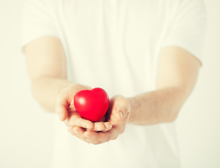 Image showing man hands with heart