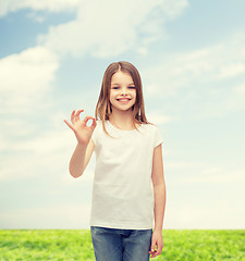 Image showing little girl in white t-shirt showing ok gesture