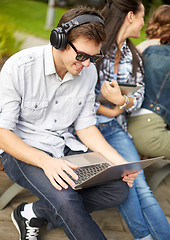 Image showing students or teenagers with laptop computers