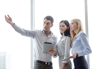 Image showing business team working with tablet pcs in office