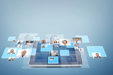 Image showing pictures of businesspeople over tablet pc