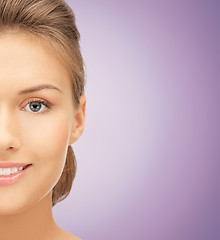 Image showing close up of beautiful young woman half face