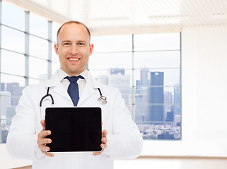 Image showing smiling male doctor with tablet pc