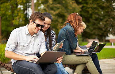 Image showing students or teenagers with laptop computers