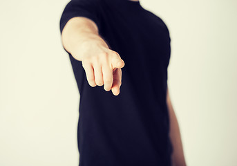 Image showing man pointing his finger at you