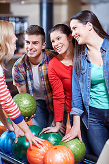 Image showing happy friends in bowling club