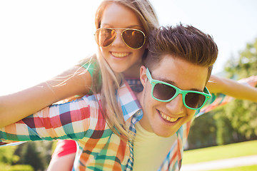 Image showing smiling couple having fun in park