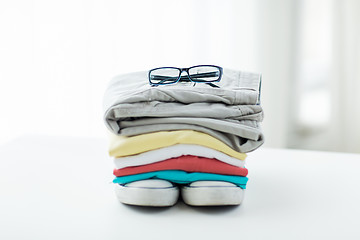 Image showing close up of clothes and accessories on table