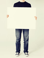 Image showing man showing white blank board