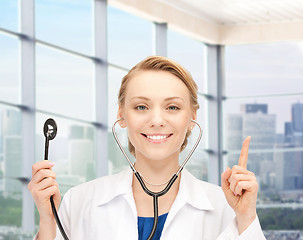 Image showing happy female doctor with stethoscope