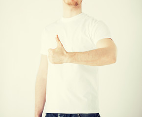 Image showing man showing thumbs up