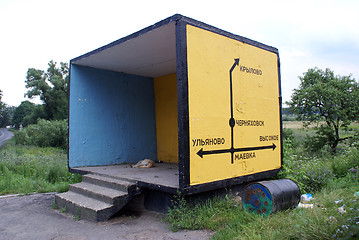 Image showing Dog on the bus stop