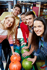 Image showing happy friends in bowling club