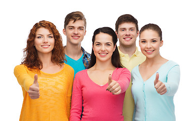 Image showing group of smiling teenagers showing thumbs up