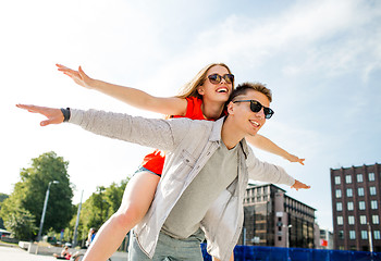 Image showing smiling couple having fun in city