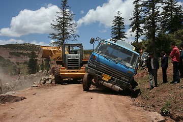 Image showing Truck stuck on muddy road