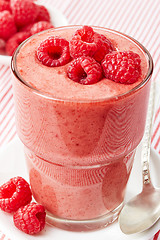 Image showing glass of raspberry and banana smoothie