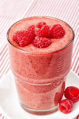 Image showing glass of raspberry and banana smoothie