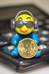 Image showing Plasticine man with euro coin