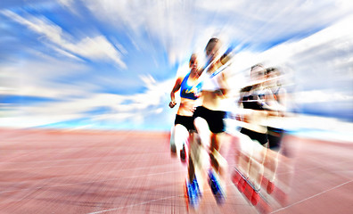 Image showing Young female athletes competing in the race