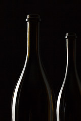 Image showing Silhouettes of elegant wine bottles