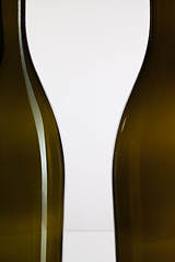 Image showing Empty bottles of wine and romantic symbol