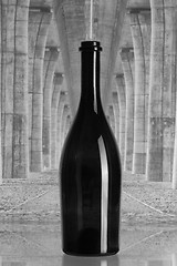 Image showing Wine bottle under the highway bridge