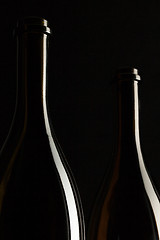 Image showing Silhouettes of elegant wine bottles