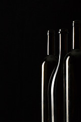 Image showing Silhouettes of elegant wine bottles