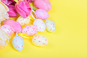 Image showing Easter eggs and pink tulips