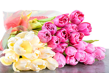 Image showing Tulips bouquets on the table