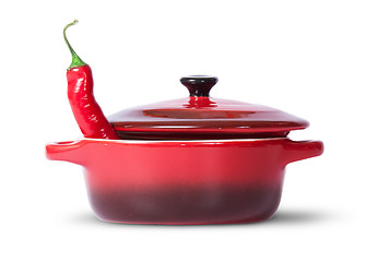 Image showing In front red chili pepper in saucepan with lid