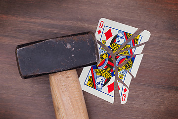 Image showing Hammer with a broken card, queen of diamonds