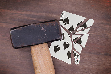 Image showing Hammer with a broken card, eight of spades