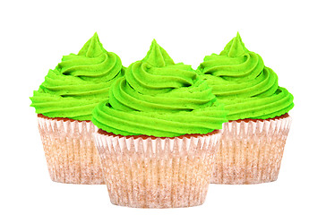 Image showing Three cupcakes with green icing