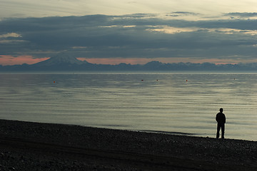 Image showing Cook Inlet beach sunset with a man silouette