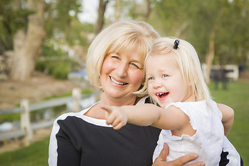 Image showing Grandmother and Granddaughter Playing At The Park