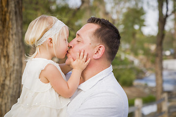 Image showing Father Playing With Cute Baby Girl Outside at the Park