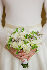 Image showing Beautiful wedding bouquet in hands