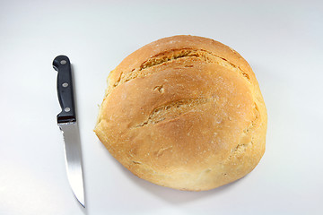 Image showing loaf and knife