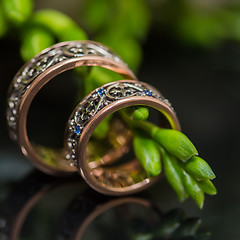 Image showing Two wedding rings in infinity sign. Love concept.