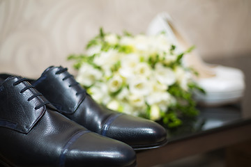 Image showing Bride's and groom's shoes on parquet.