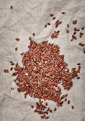 Image showing natural flax seeds on linen napkin