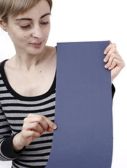 Image showing Woman holding a paper