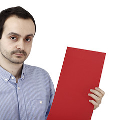 Image showing Man holding a paper