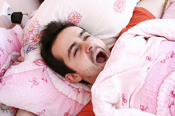 Image showing Young man sleeping .